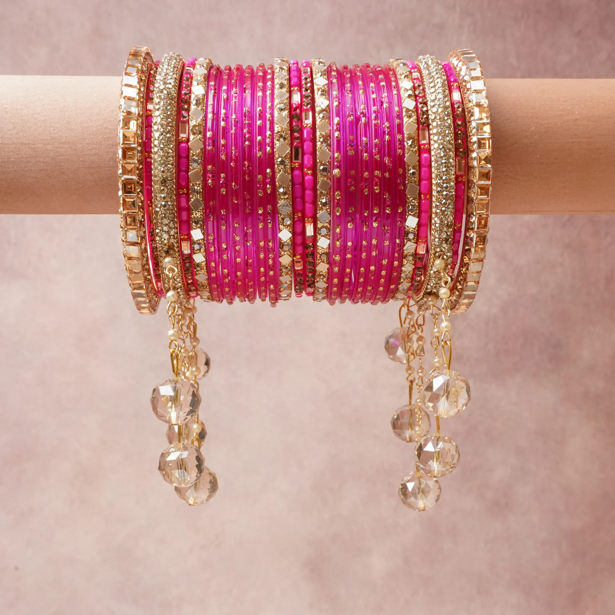 A majestic Fuchsia set, complemented by Gold, Silver, Champagne, Pearl White featuring Glass, Gold-toned Metal, Mirrored Glass, Rhinestone Crystal, Faceted Glass, Faux Pearl.
Rich, ceremonial, and designed to be passed through generations.